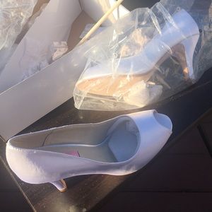 Brand new! Never worn white satin heels, size 8.5